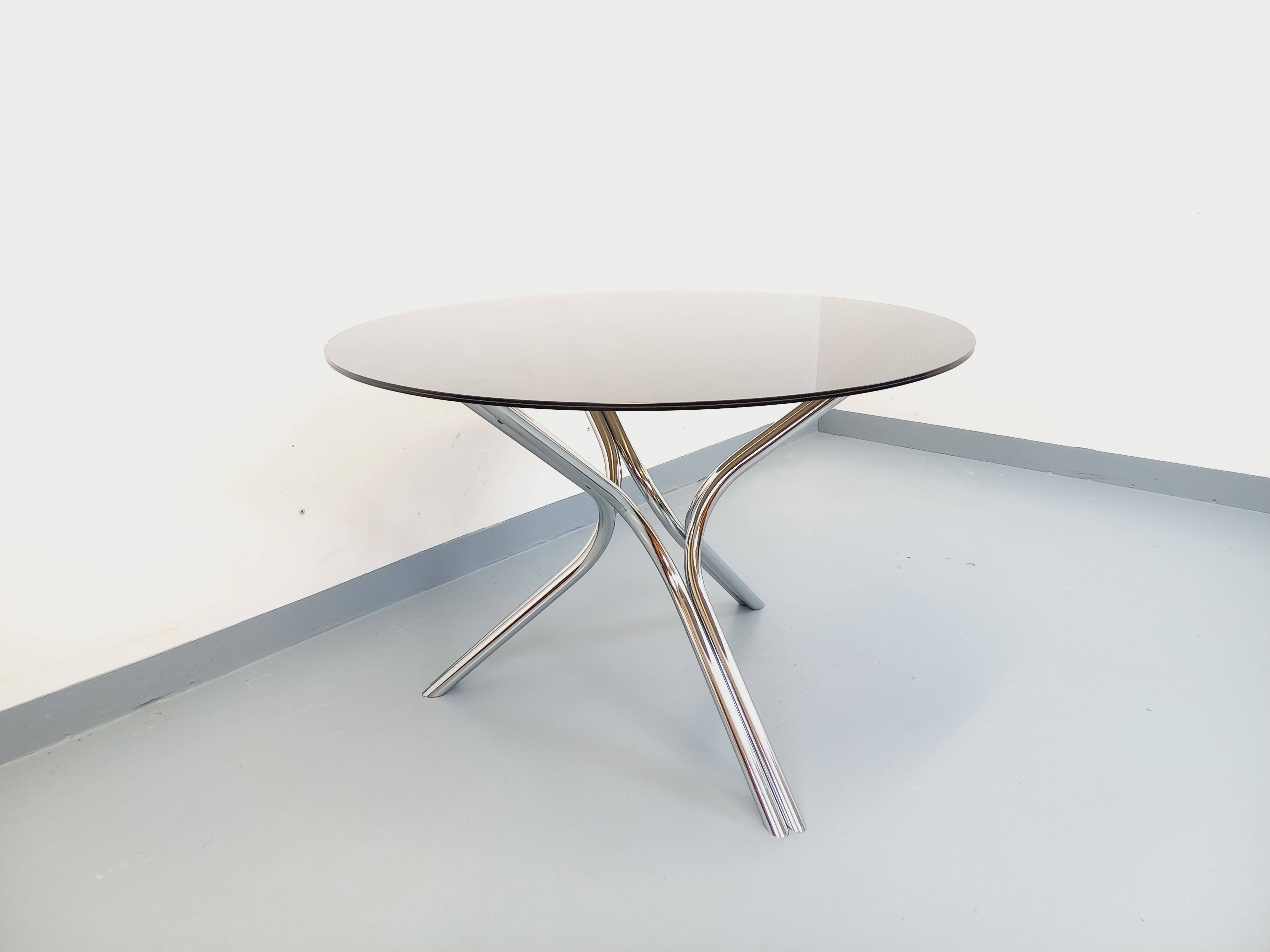 Vintage dining table in smoked glass plexiglass and chrome metal.