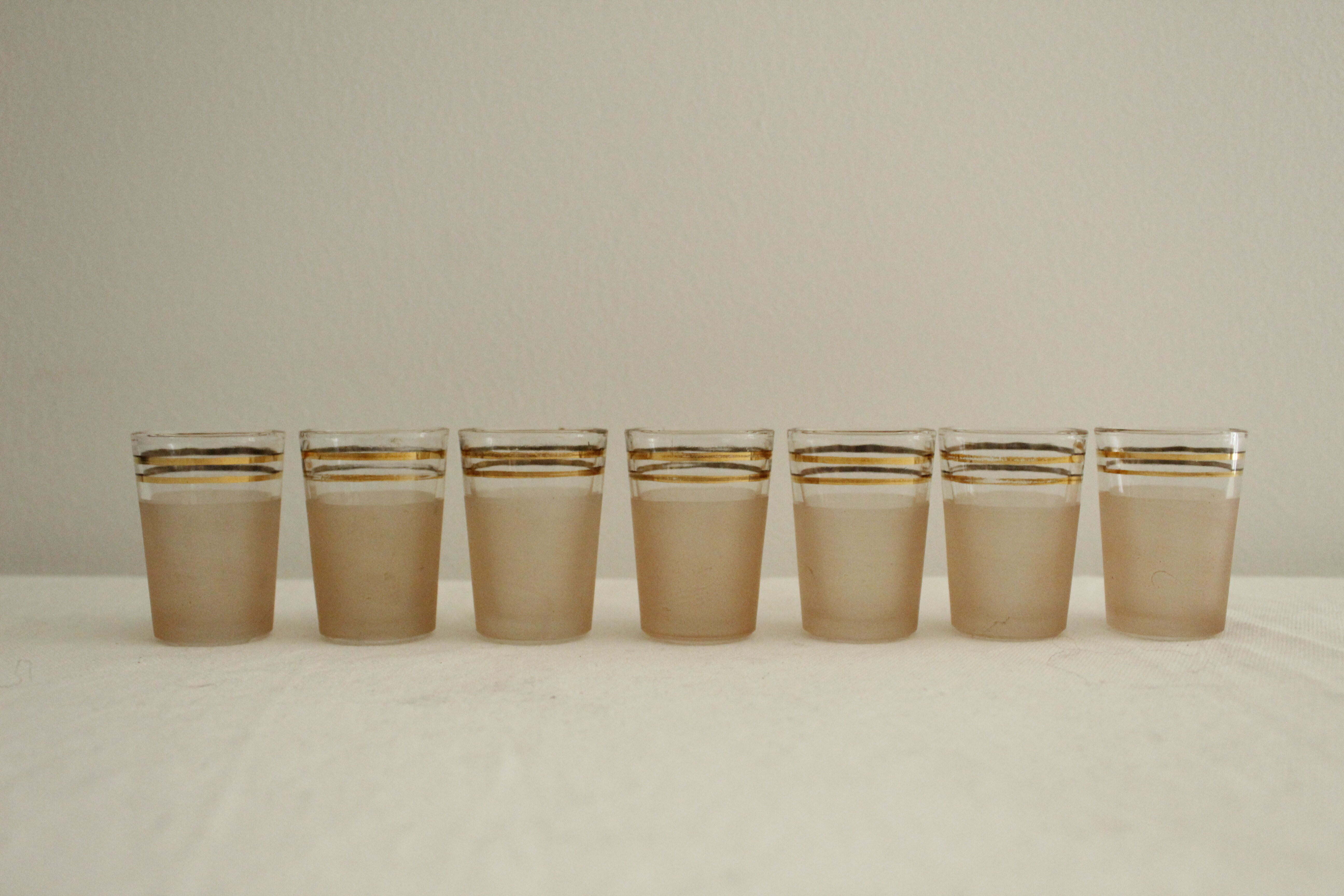 7 pink and gold vintage glass liquor glasses