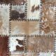 Patchwork carpet in cowhide 164x105cm from the 70s