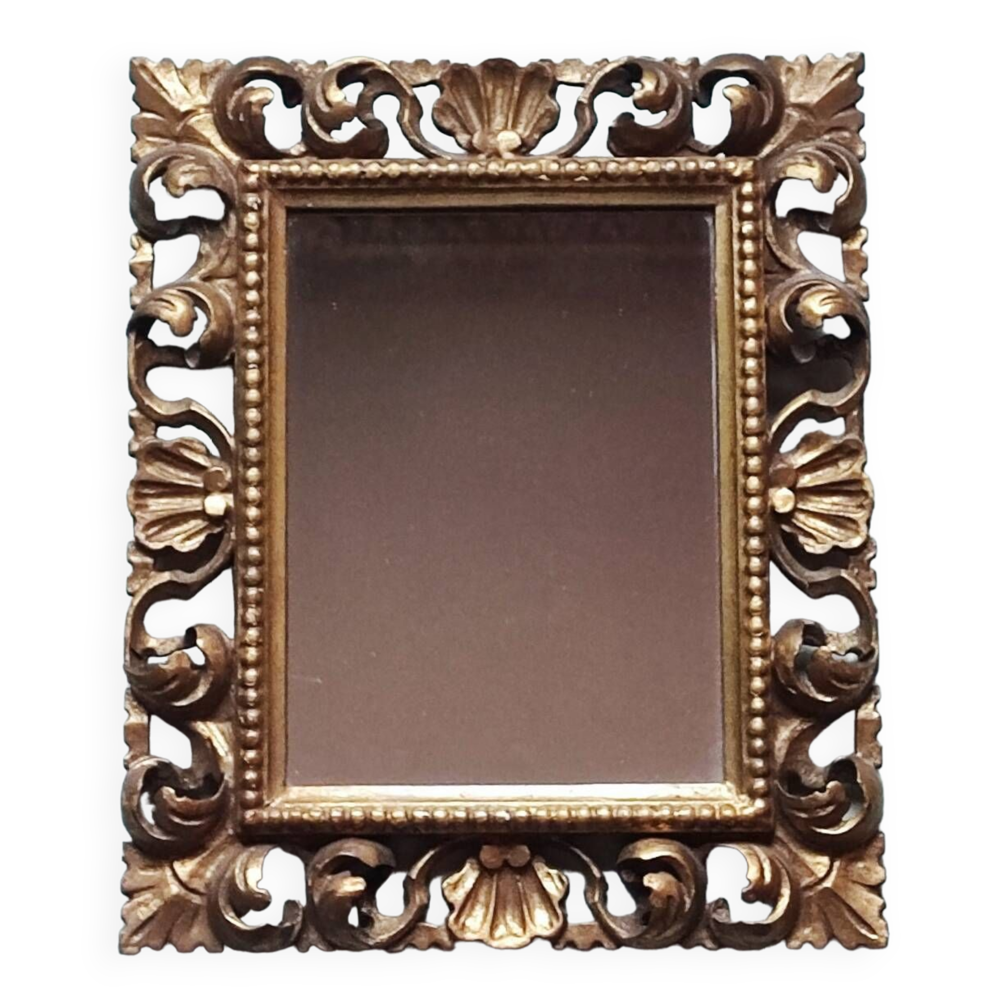 Miroir en bois sculpté et doré