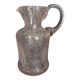 Small blown glass pitcher with bubbles from the 20th century.