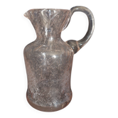 Small blown glass pitcher with bubbles from the 20th century.