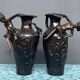 Pair of Art Nouveau vases in solid bronze.