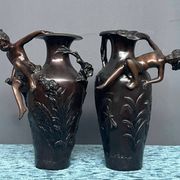 Pair of Art Nouveau vases in solid bronze.