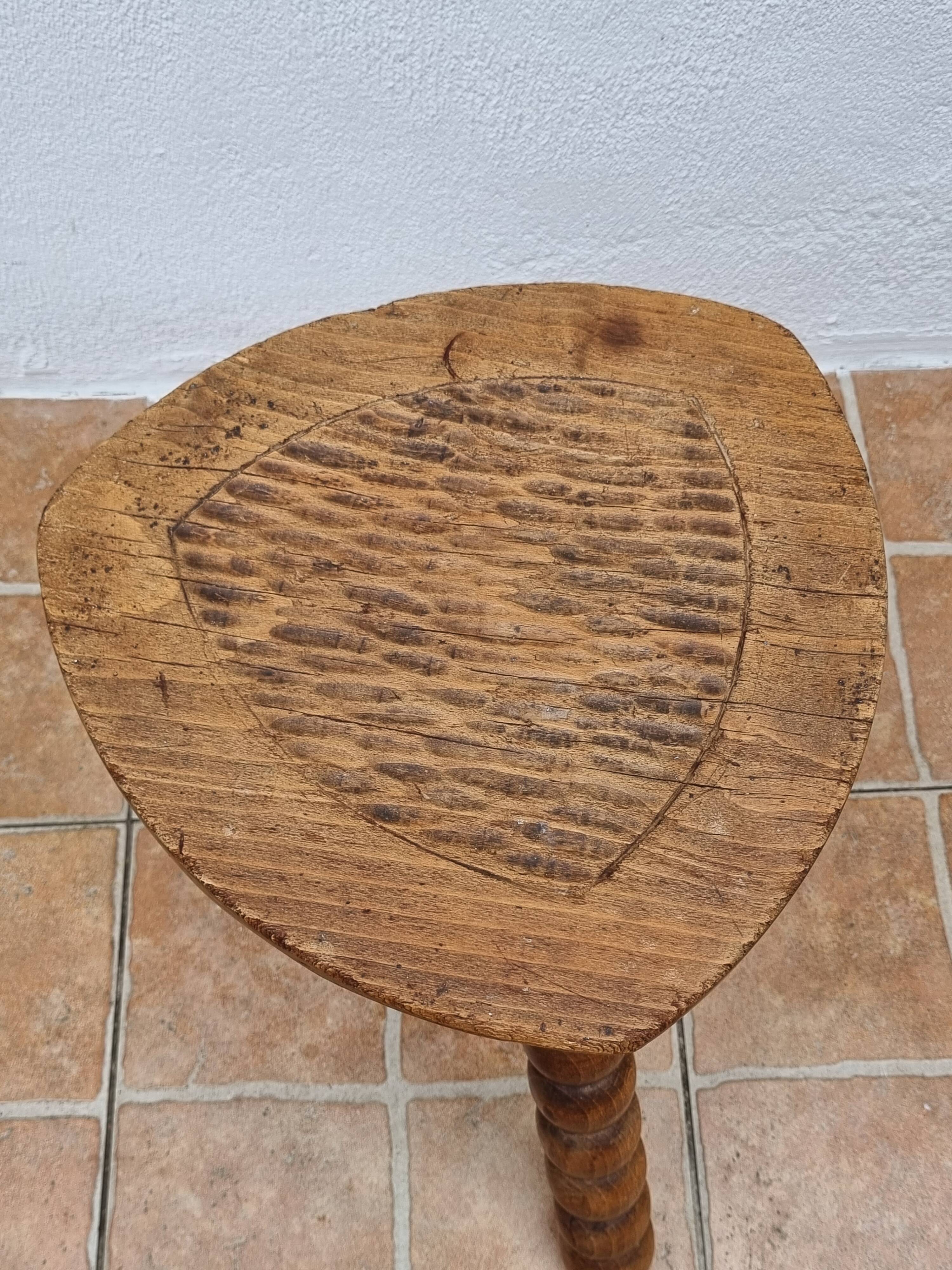 Rustic solid wood tripod stool with turned legs, 45 cm high
