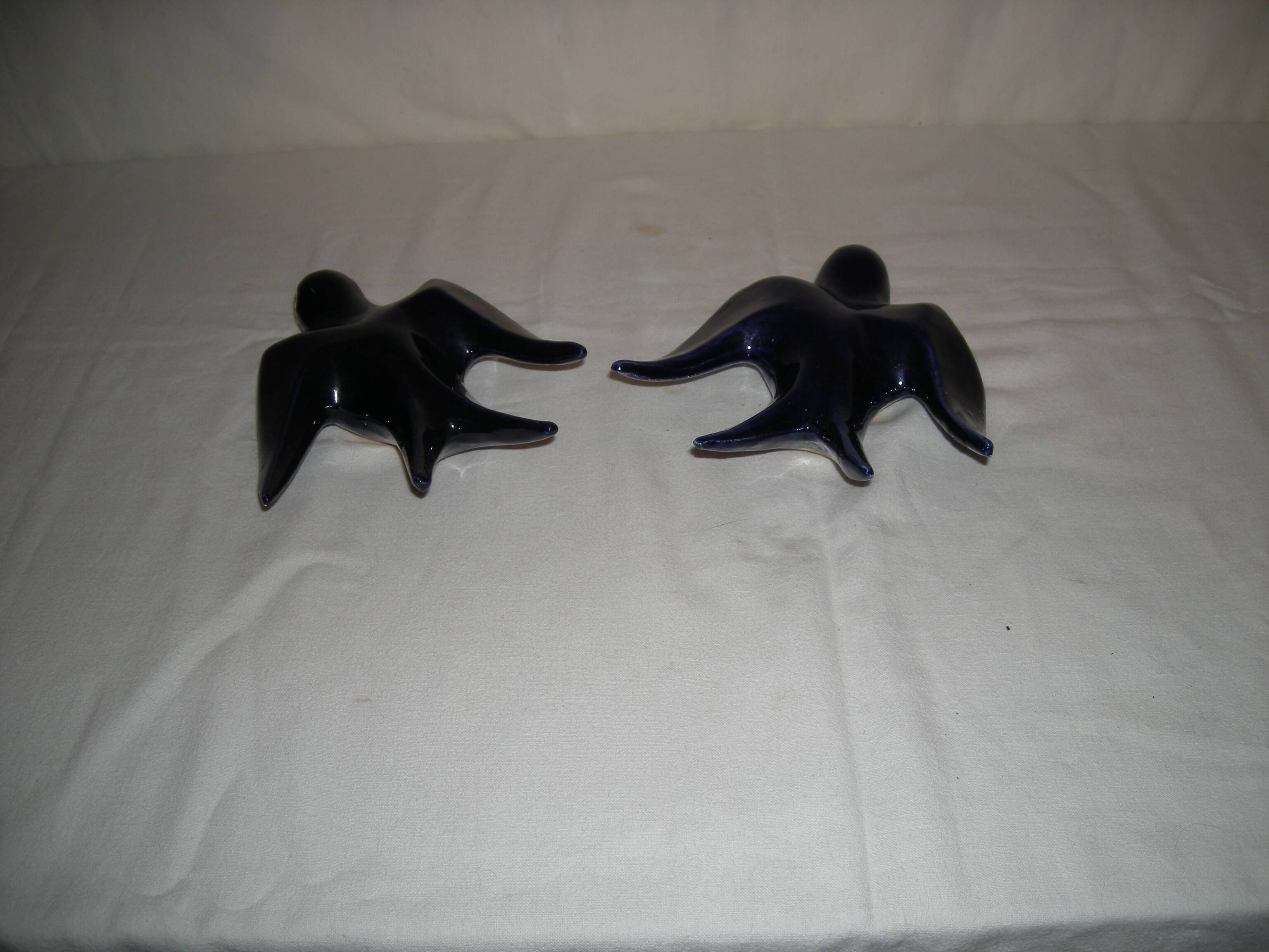 Pair of ceramic wall swallows
