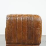 Cognac-colored cowhide 2-seater designer sofa finished with piping