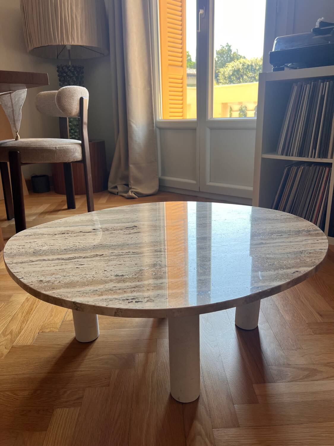 Organic coffee table in travertine.