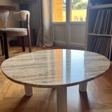 Organic coffee table in travertine.