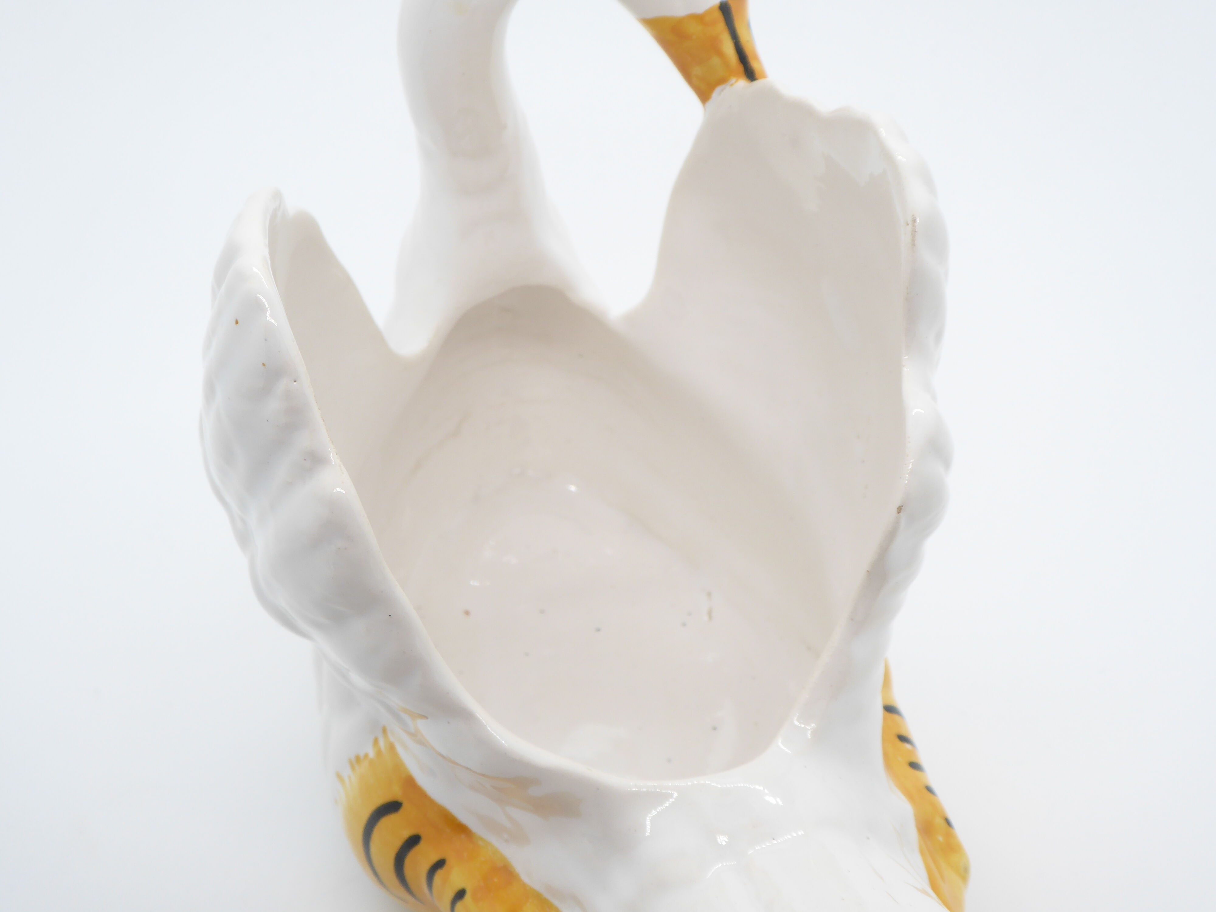 Ceramic pot cover in the shape of a swan