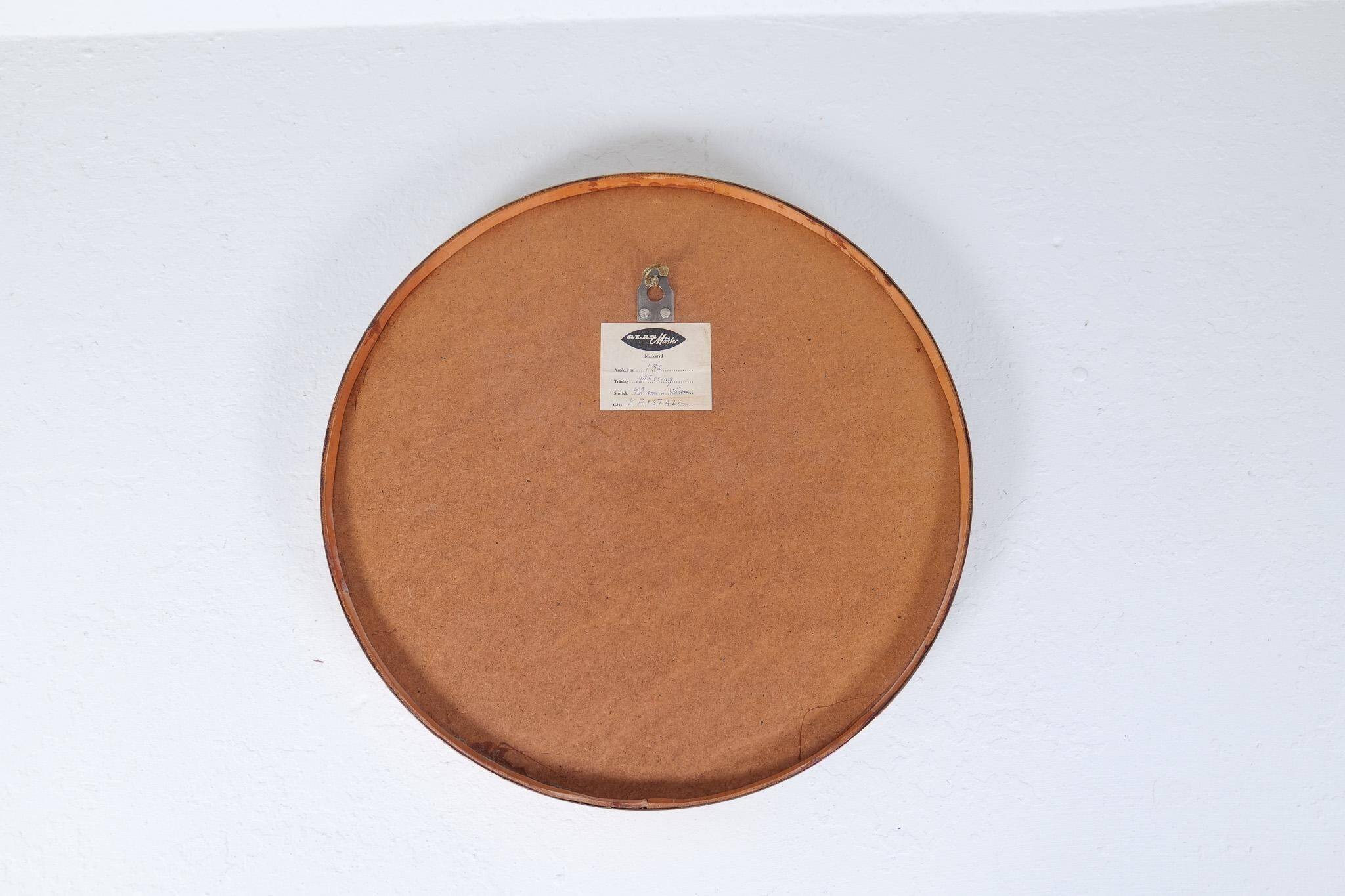 Round brass mirror from the mid-century by Glasmäster in Markaryd, Sweden, 1960s.