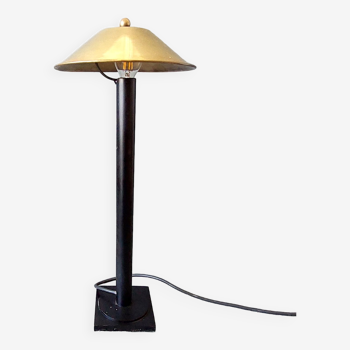 Post-Modern lamp in black metal and gilded brass.