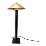 Post-Modern lamp in black metal and gilded brass.