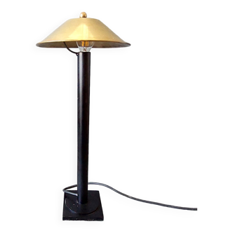 Post-Modern lamp in black metal and gilded brass.