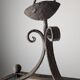 Wrought iron lantern with glass panels, leaf motifs