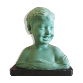 Laughing child bust in plaster