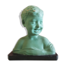 Laughing child bust in plaster