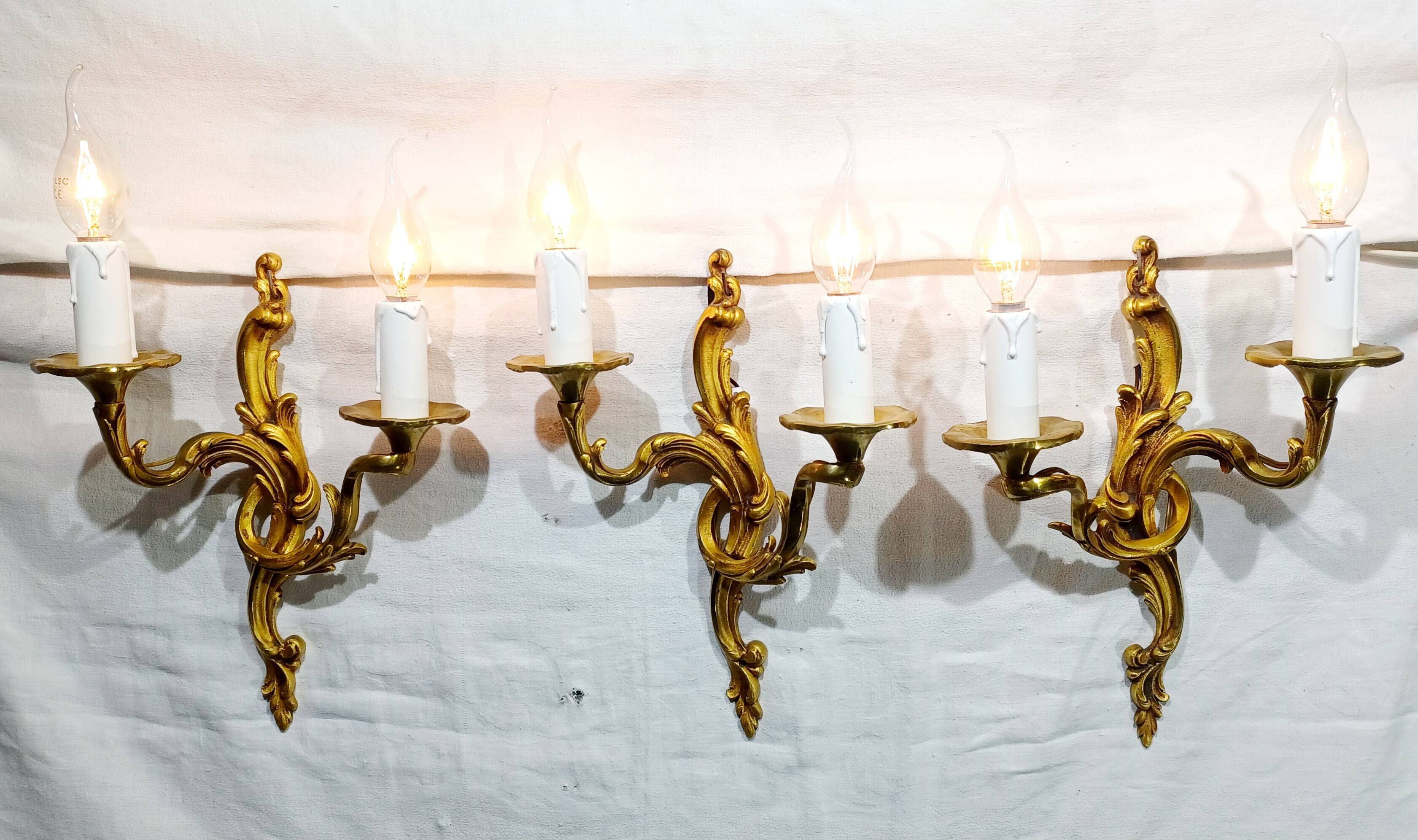 Bronze wall light triplet