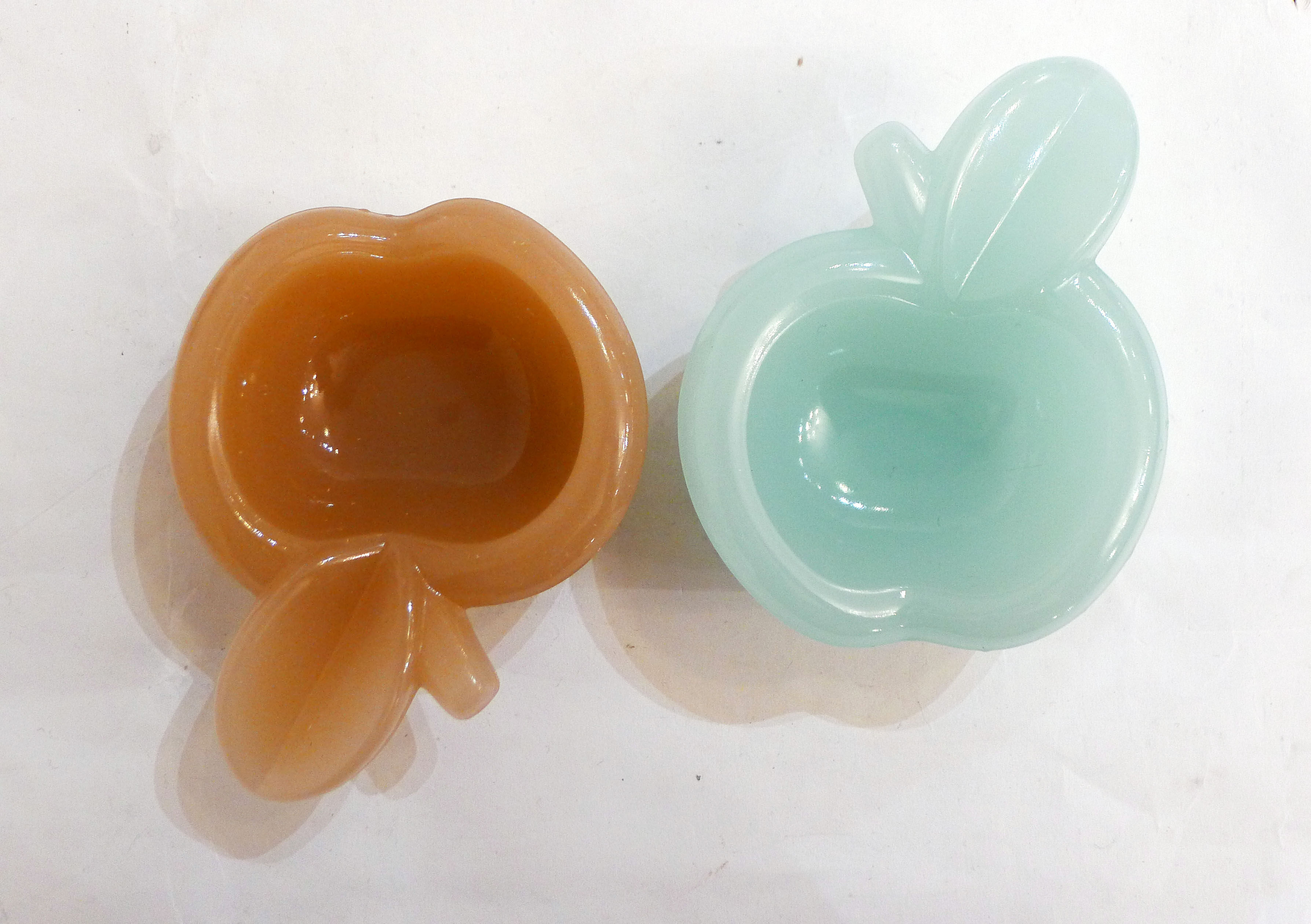 Pair of Apple opalin ashtrays