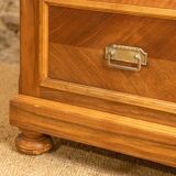 Antique washbasin cabinet from 1928 in wood and marble with a lighted mirror.
