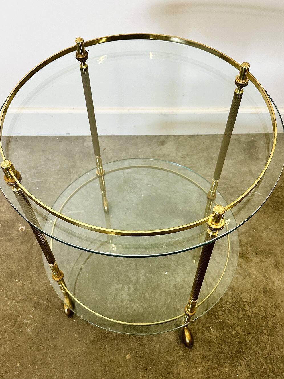 1970s mid-century modern Italian brass and glass round bar cart, Italy.