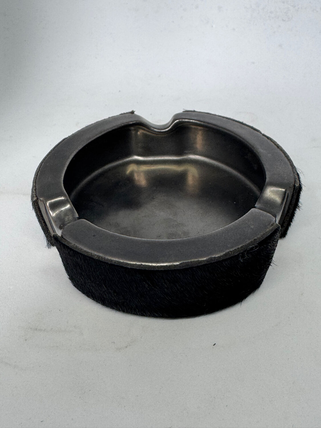 Vintage metal ashtray and hair