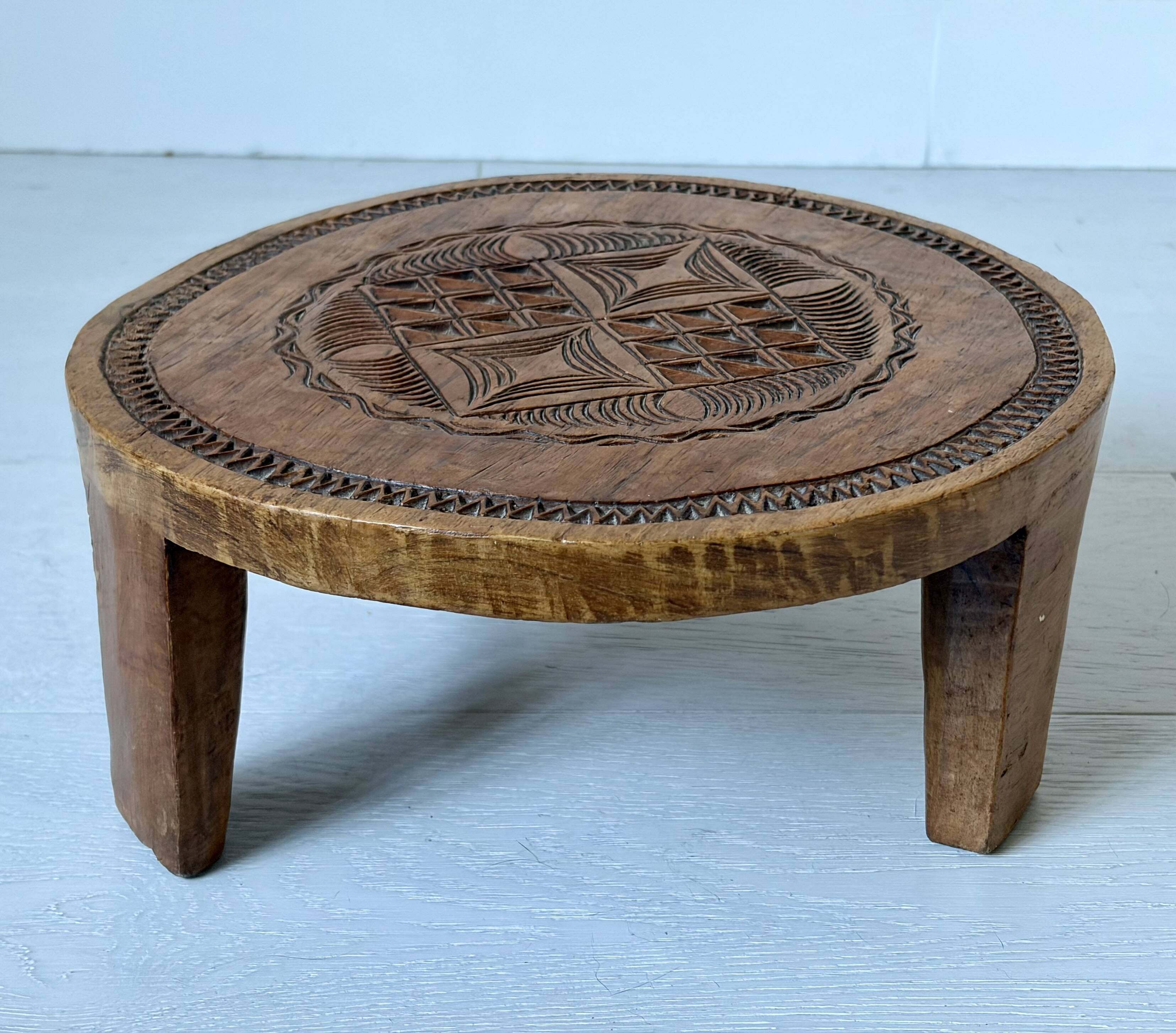 Solid wood monoxyle piece hand-carved.