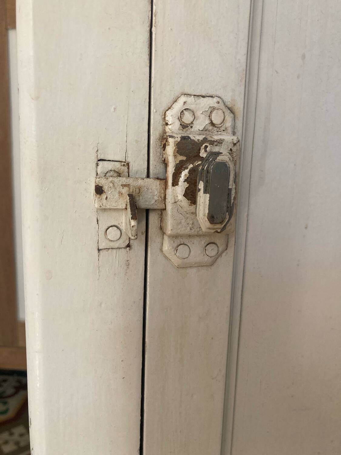 Antique patinated jam cupboard