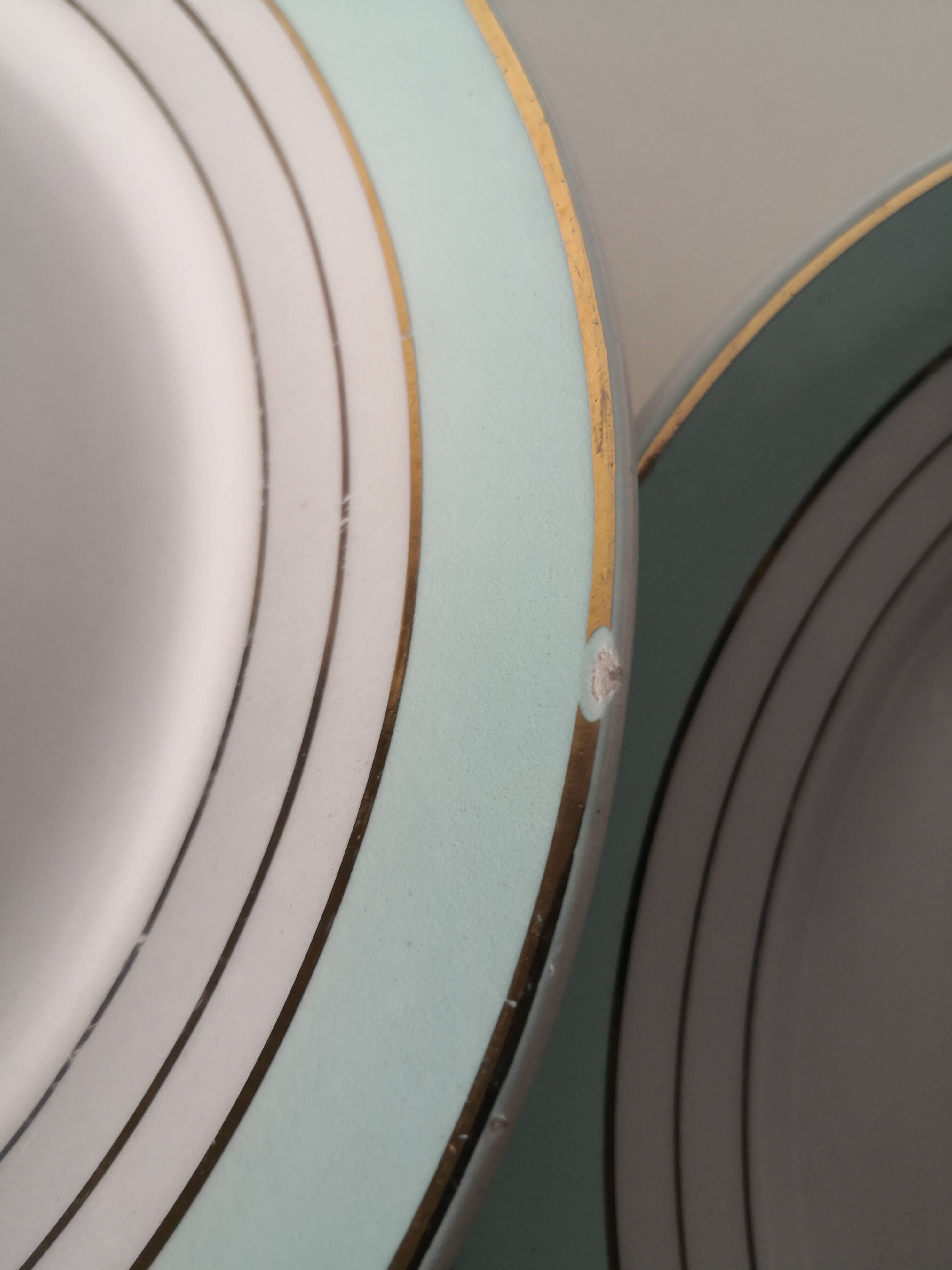 set of 9 green, white and gold Luneville plates