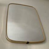 Asymmetrical free-form mirror from the 60s
