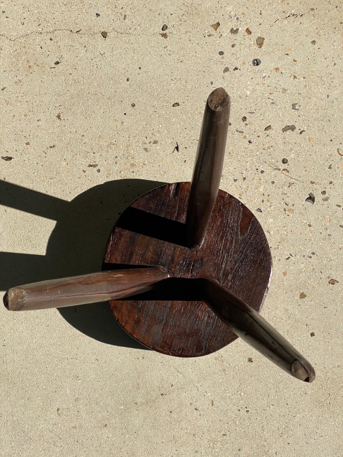 Brown solid wood stool seated circular dug