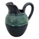Stoneware jug with glaze