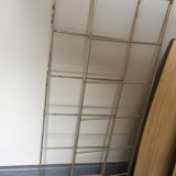String shelf with wooden trays and formica
