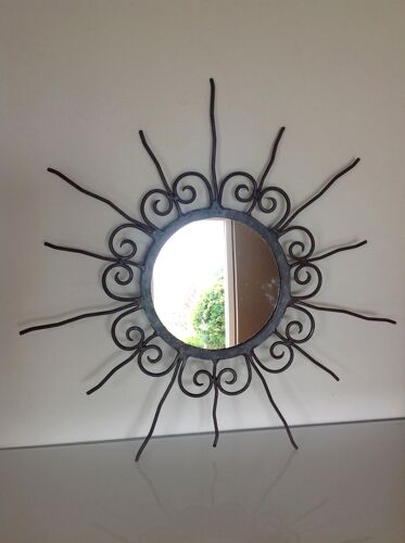 Ancien miroir soleil en fer