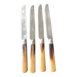 Pop-up Christmas 2022 Set of 4 knives in horns and chiseled metal dating from the early twentieth century.