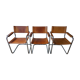 Trois fauteuils en cuir