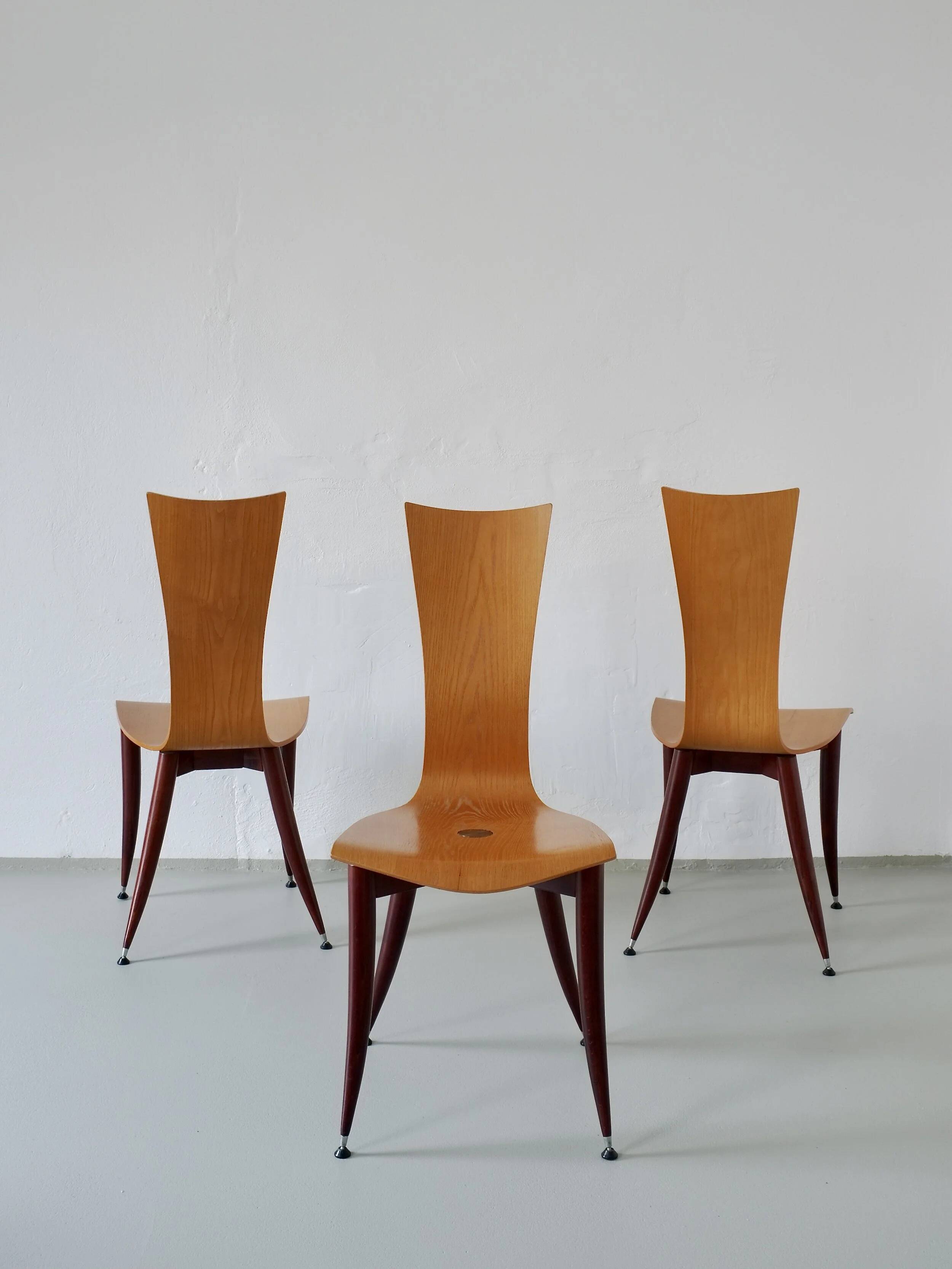 3 plywood chairs with burgundy legs | Italy | 1980s