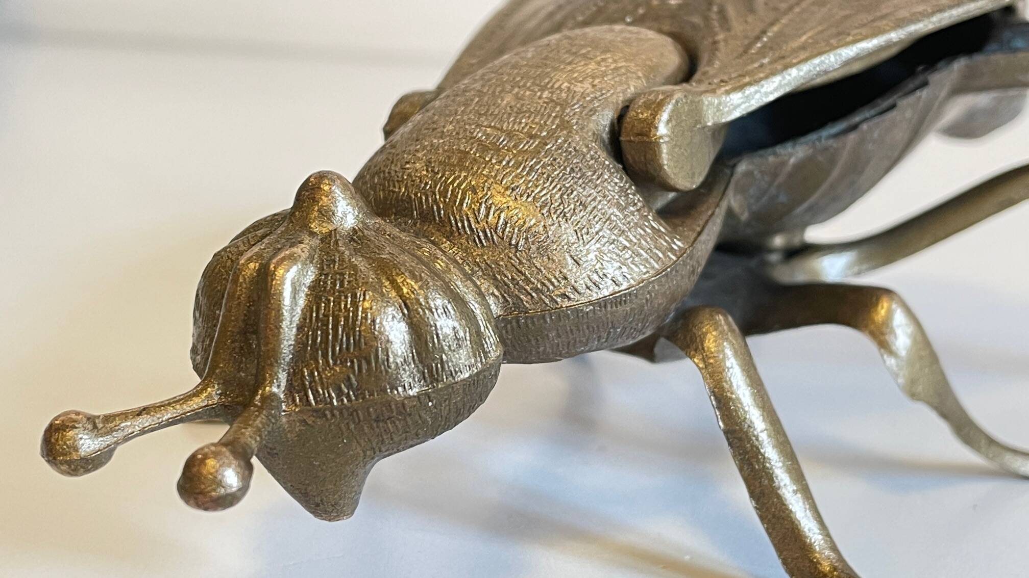 Vintage fly ashtray in patinated metal