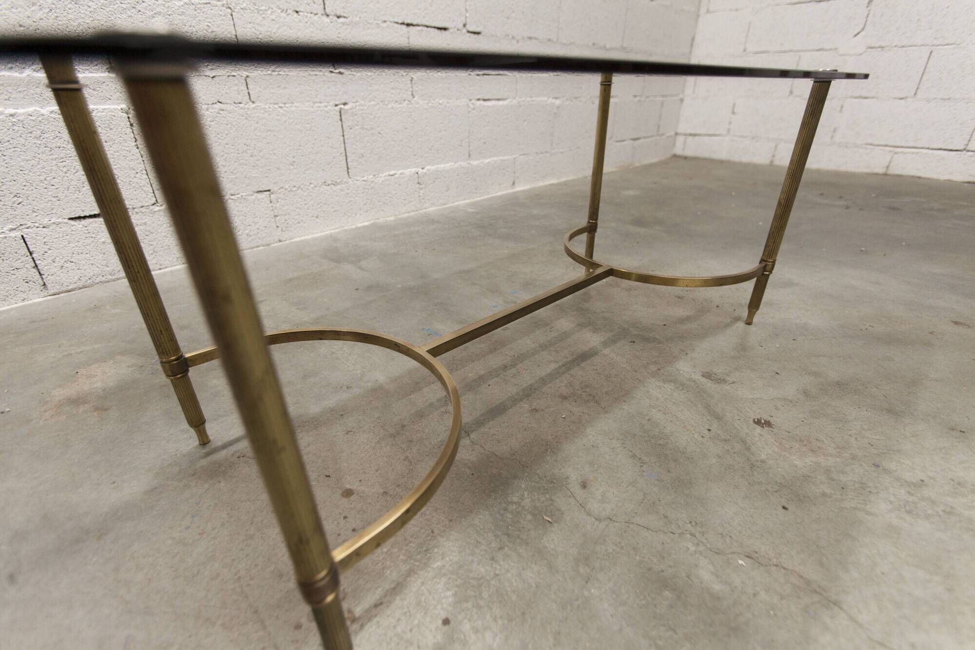 Gold brass coffee table with smoked glass 1970