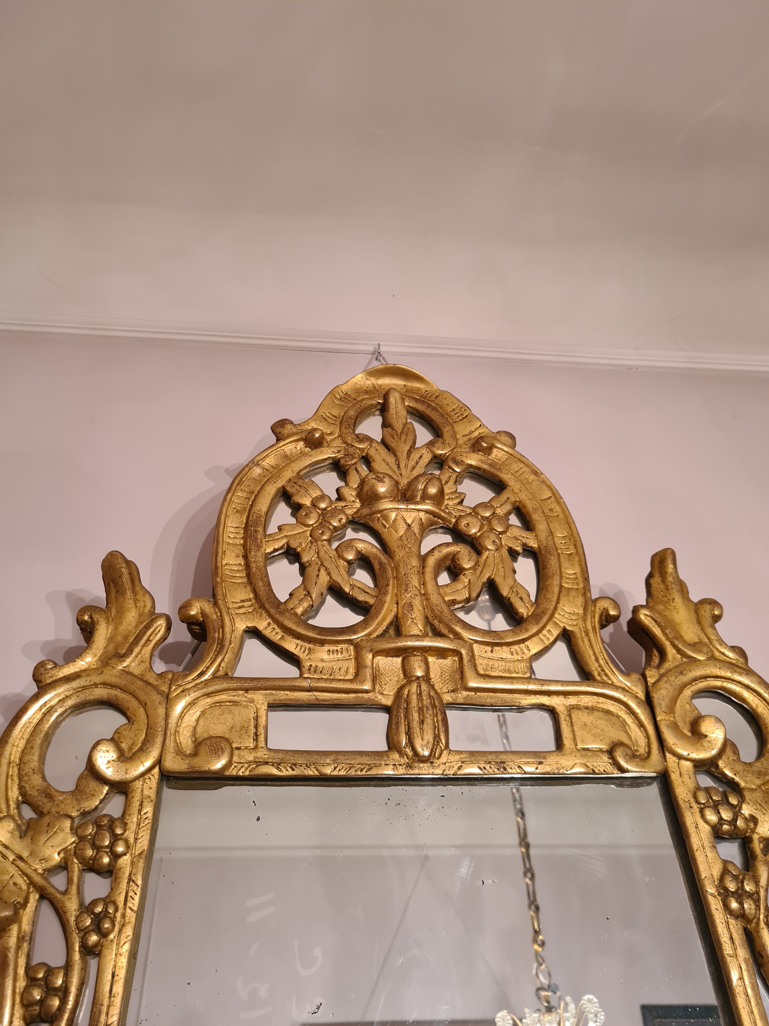 Gilded wooden mirror with parecloses, Louis XV period, circa 1750, 58x120cm