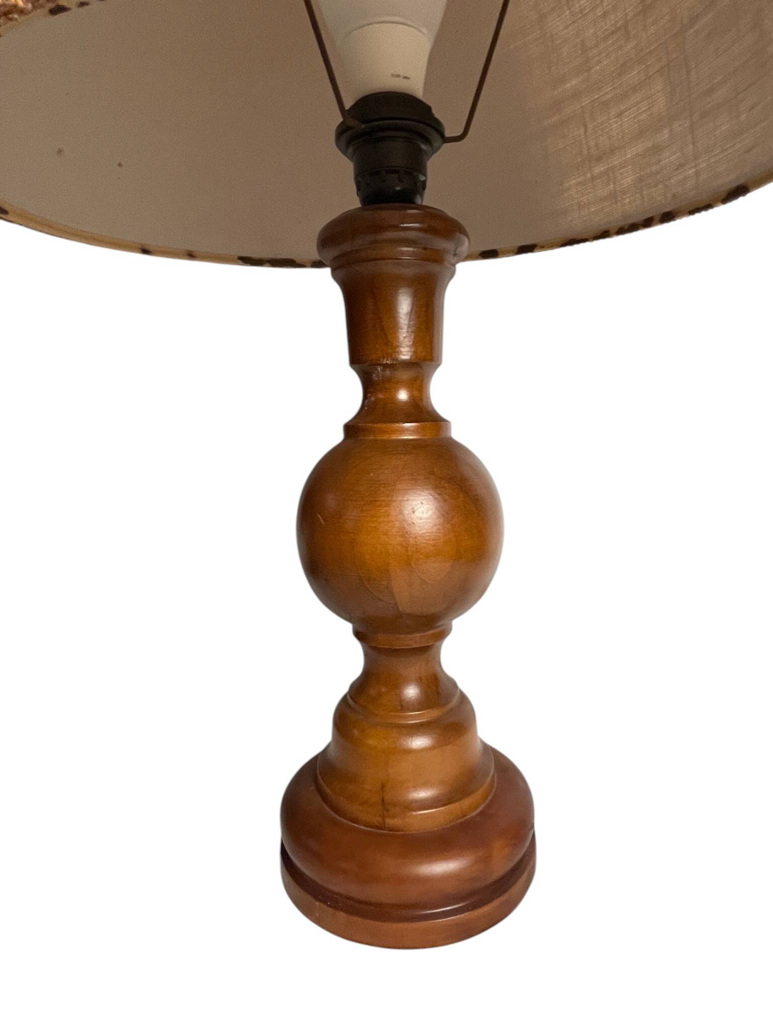 Vintage, large wooden base lamp with shade from around 1970.