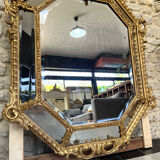 Mirror with parecloses with pediment, gilded with gold leaf