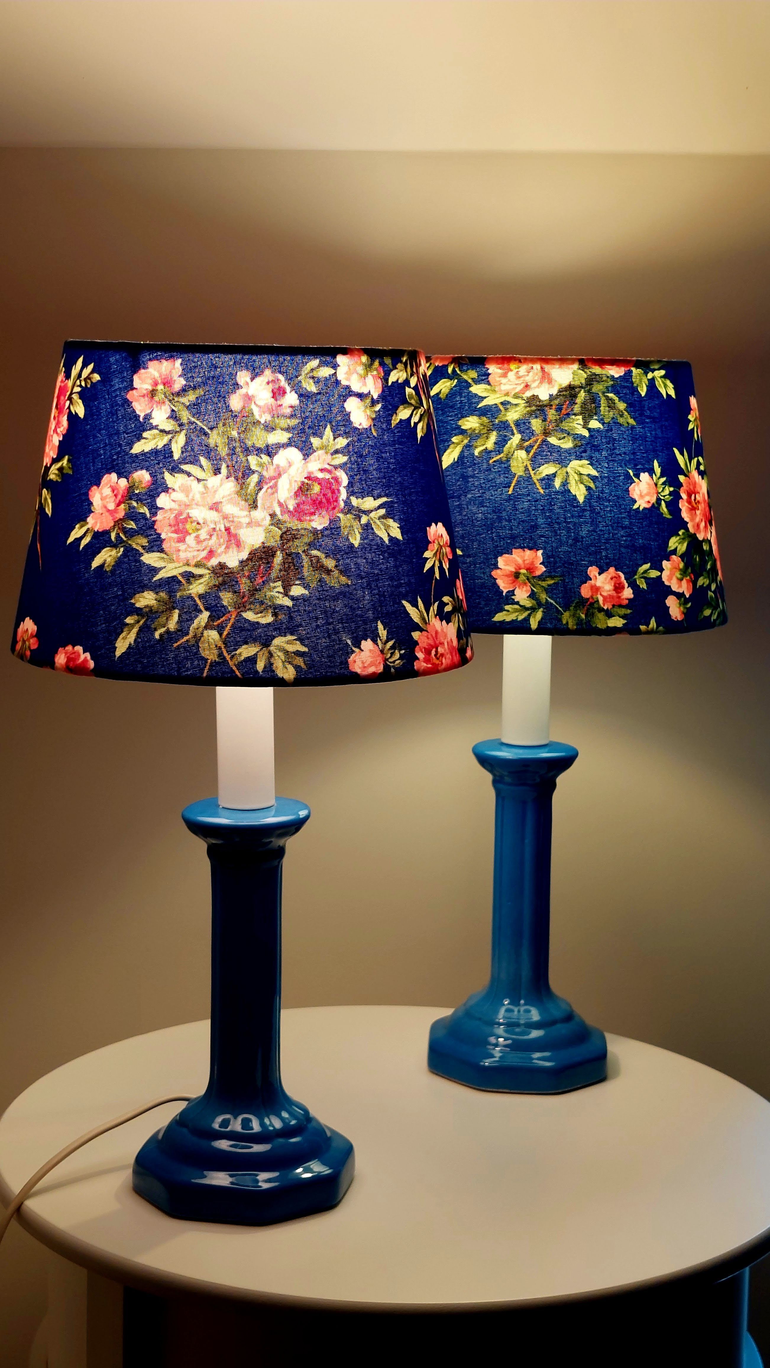 Pair of vintage blue ceramic lamps with Sanderson floral shades.