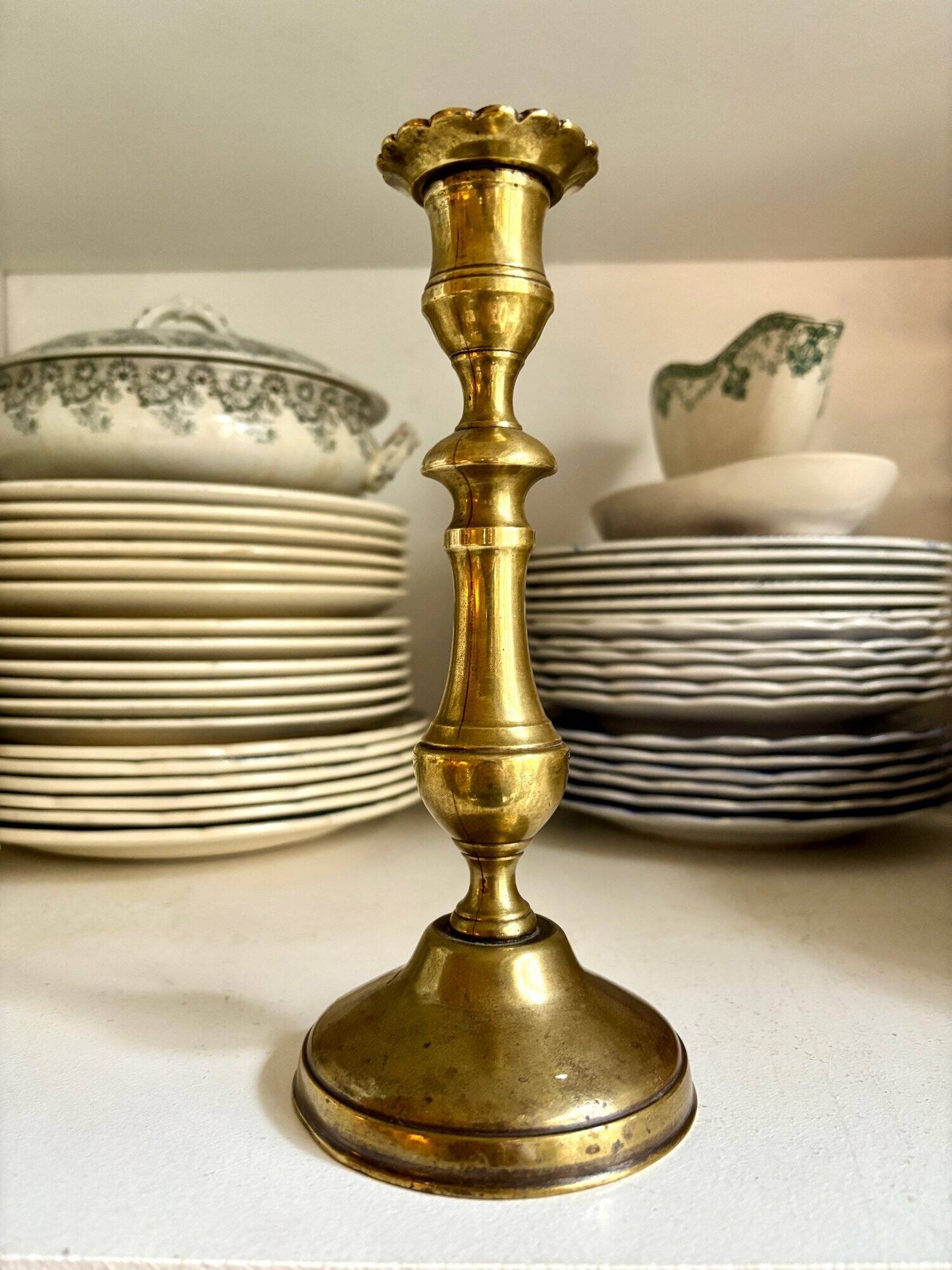 Golden brass candle holder
