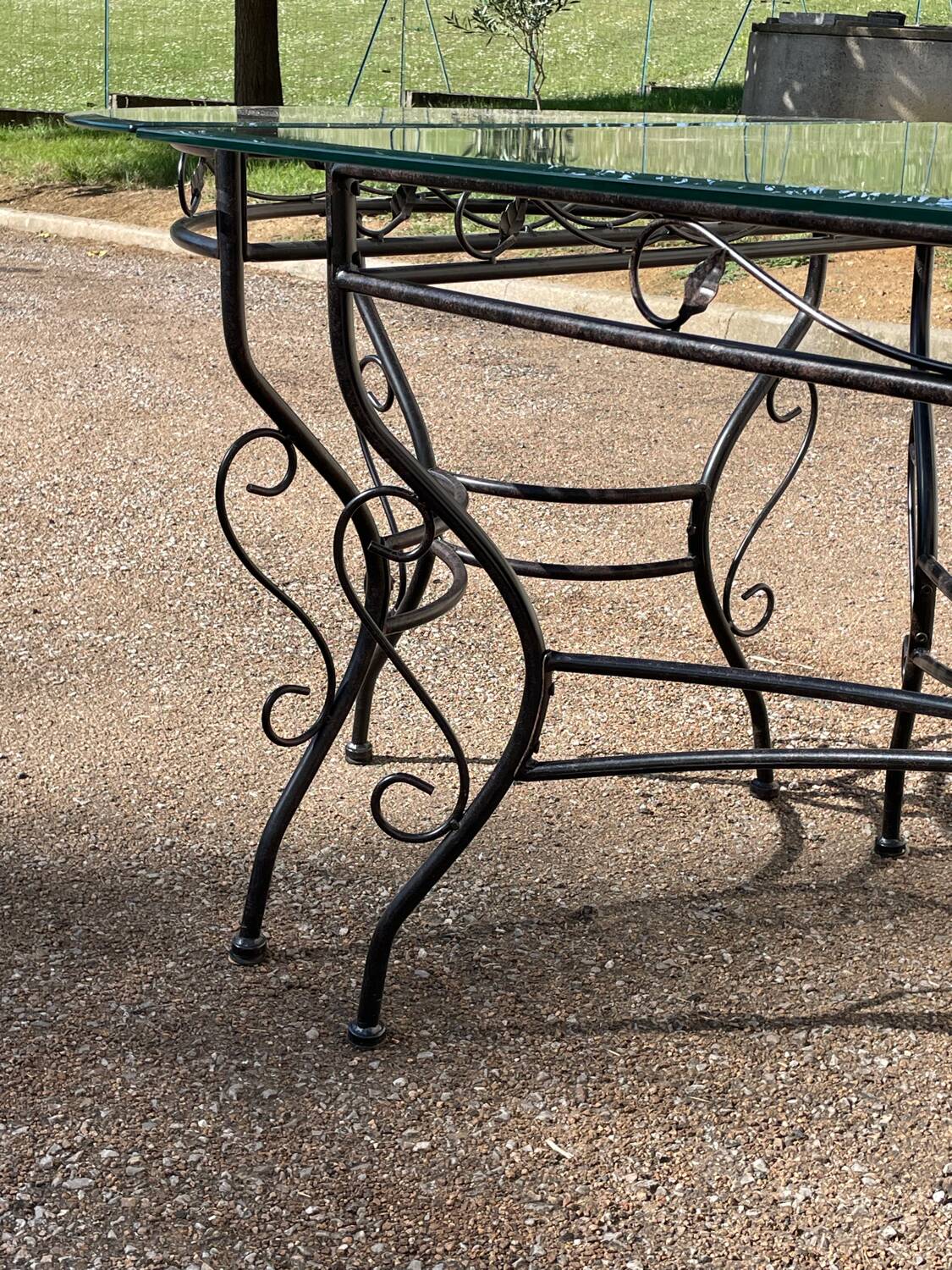 Glass and iron table with two side tables and 8 chairs