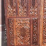 Carved solid wood screen.