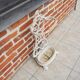 Ancien porte-parapluie en fonte émaillée blanche