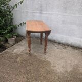 Round table with folding sides