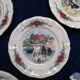 12 plates of the Obernai earthenware décor service signed Henri Loux