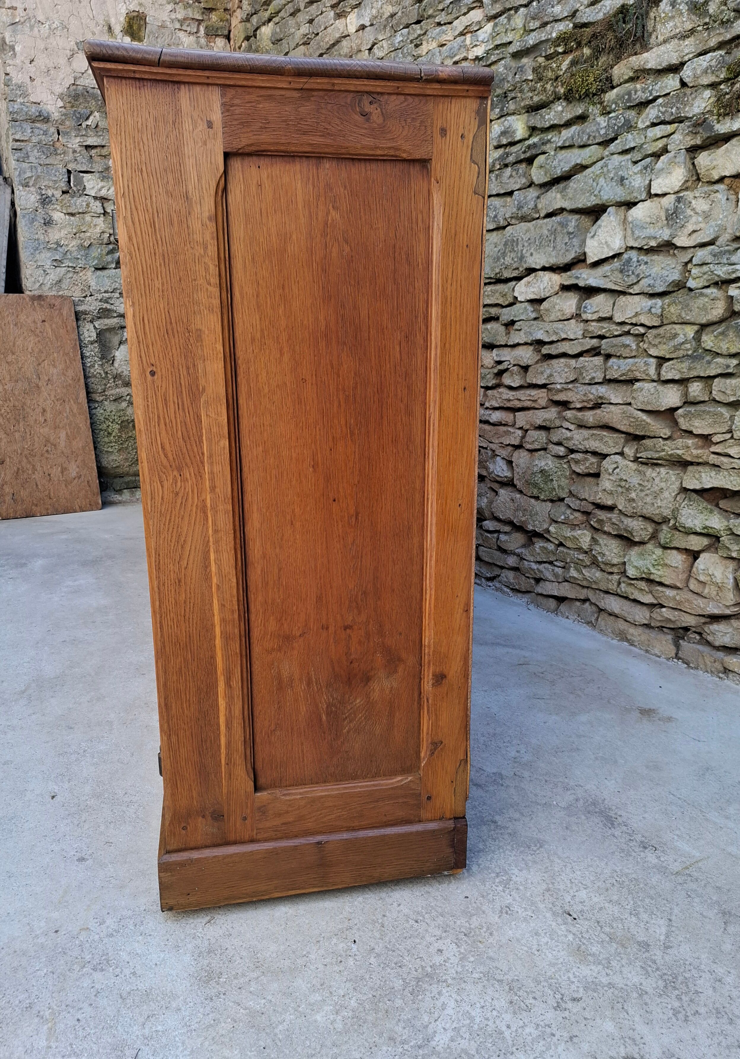 Oak workshop furniture with sliding doors.